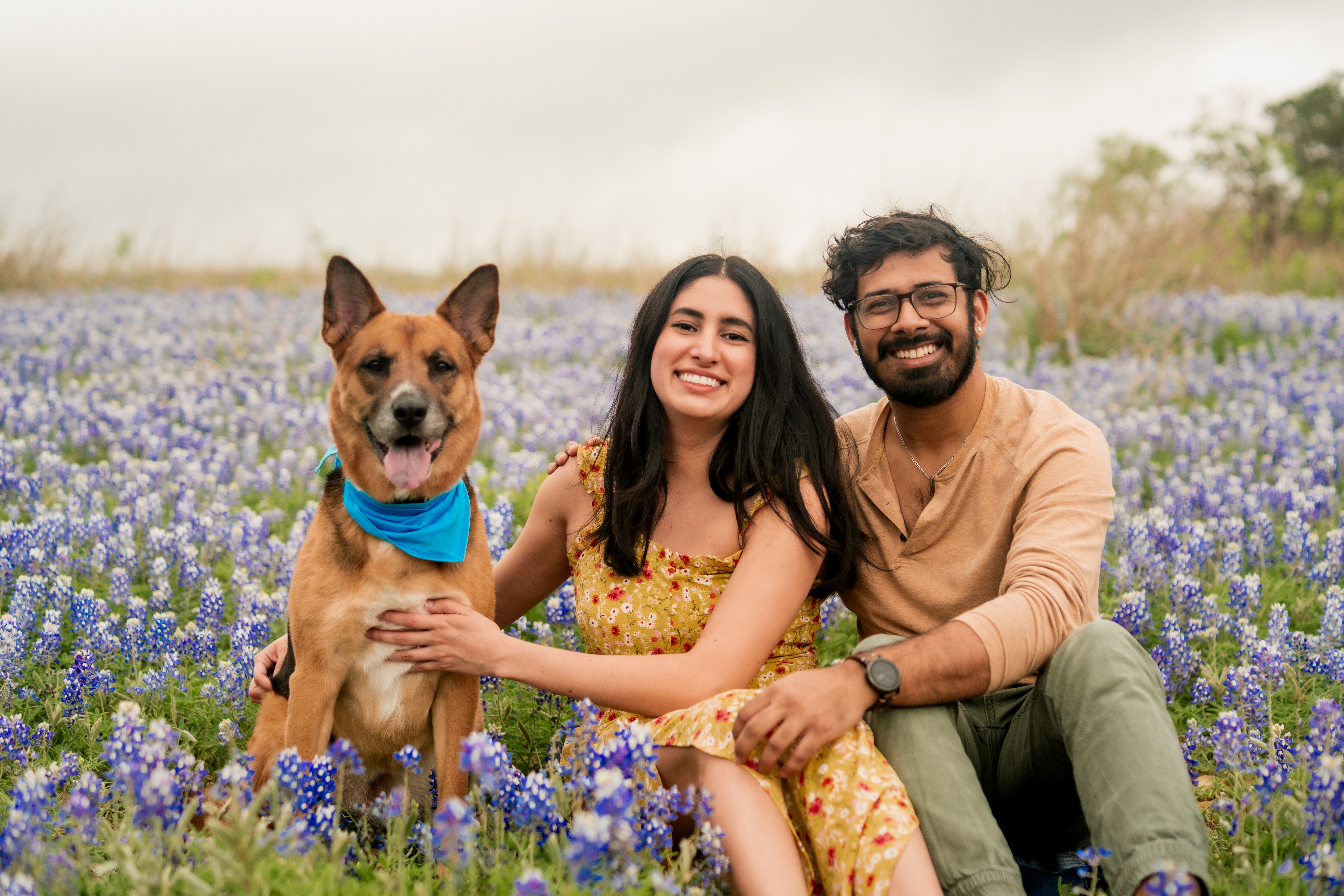 Anish with his girlfriend and their German Shepherd