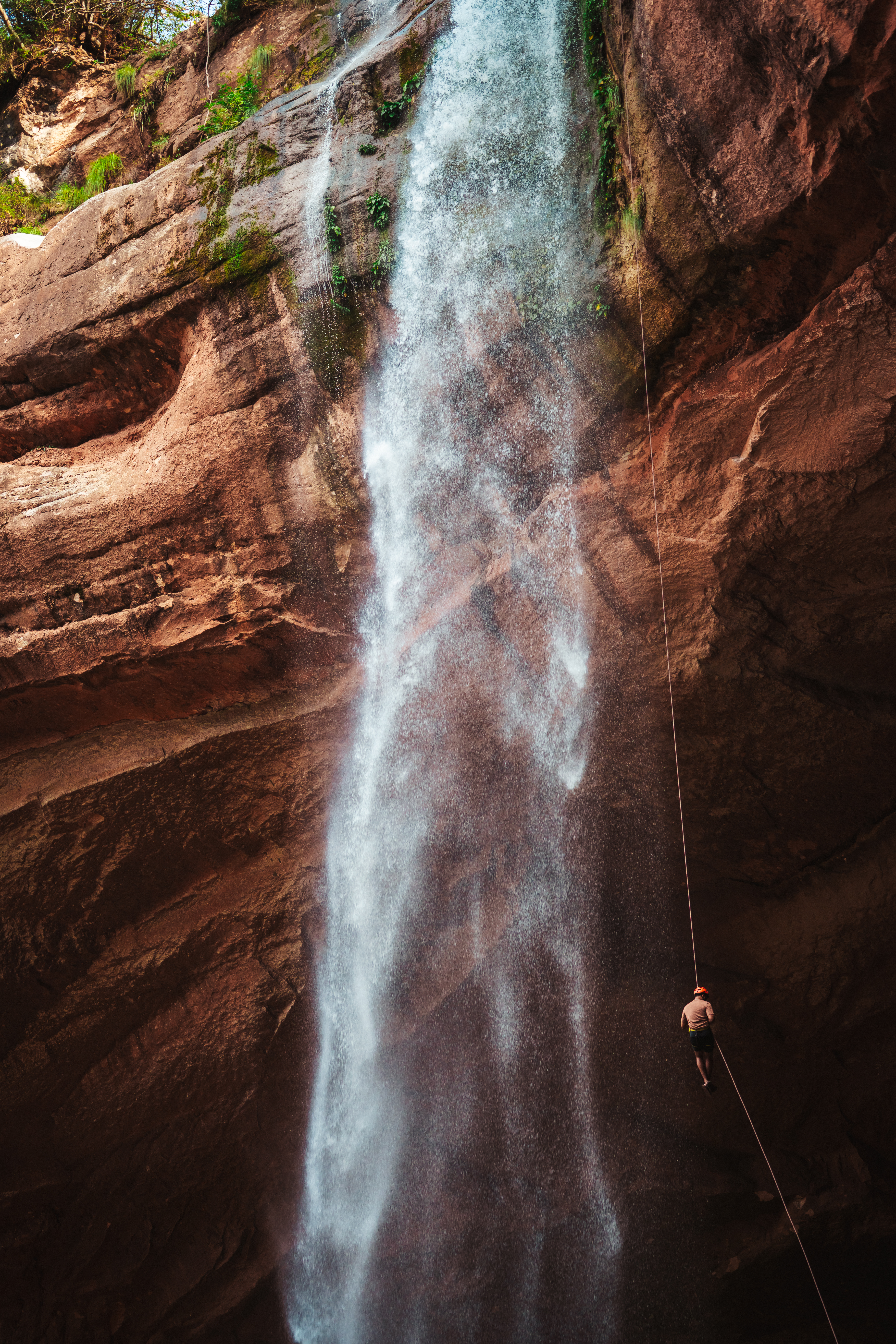 Rappelling down a waterfall somewher in Bolivia